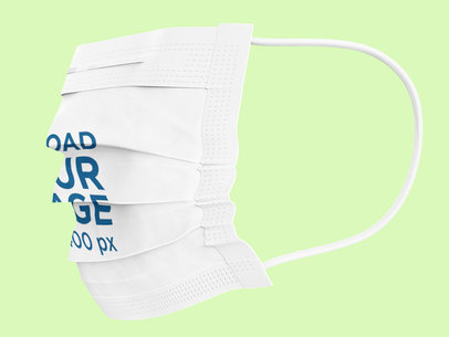 Mockup Featuring a Disposable Face Mask
