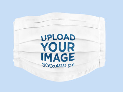 Disposable Face Mask Mockup With a Customizable Background 