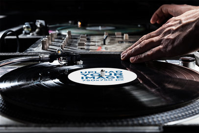 Vinyl Record Mockup of a DJ Playing a Set 4528-el1