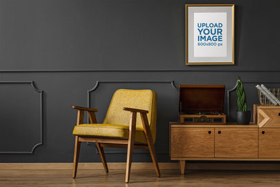 Mockup of an Art Print with a Golden Frame Hanging in a Modern Living Room 36957-r-el2