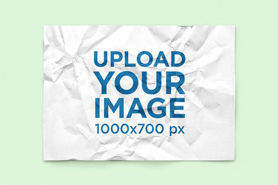 Mockup of a Crumpled Horizontal Flyer on a Solid Color Surface 4521-el1