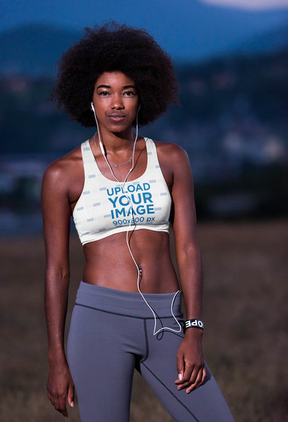 Mockup Featuring a Woman with a Sports Bra Standing by a Park 