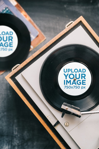 Mockup Featuring Two Vinyl Records and a Turntable 36721-r-el2