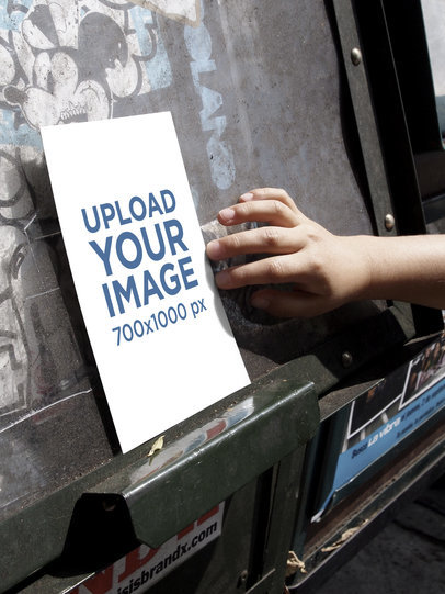 Mockup of a Poster in an Urban Scenario with Graffiti 