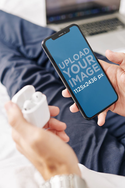 iPhone 11 Pro Mockup of a Man Pairing His AirPods 37305-r-el2