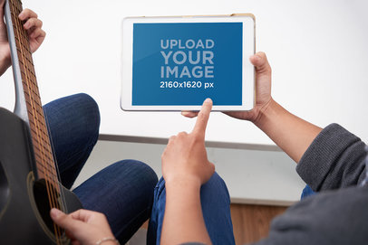 Mockup of Two Musicians Holding an iPad in Landscape Mode 37032-r-el2