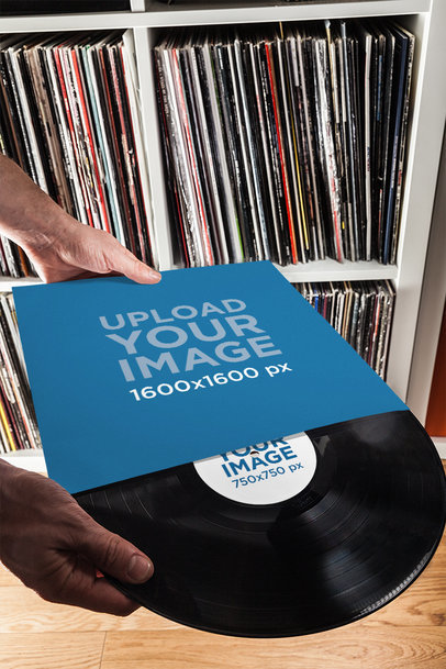 Mockup of a Man Holding a Vinyl Record and Its Cover 