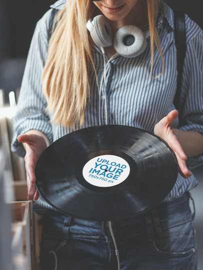 Mockup of a Woman Holding a Vinyl Record 36719-r-el2