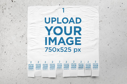 Mockup of a Tear-off Flyer Placed Over a Concrete Wall