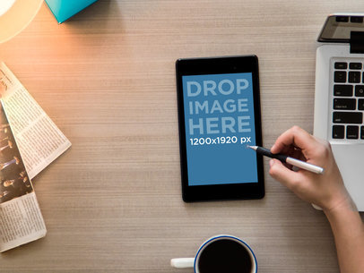 Mockup of a Man Working on His Nexus 7 