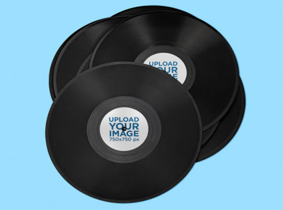 Mockup Featuring Several Vinyl Records Placed on a Plain Color Surface 37198-r-el2