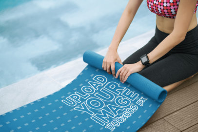 Mockup of a Woman Rolling up Her Yoga Mat After Practice