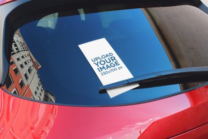 Mockup of a Vertical Flyer on the Back Window of a Car