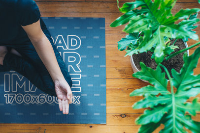 Mockup of a Woman Sitting on a Yoga Mat