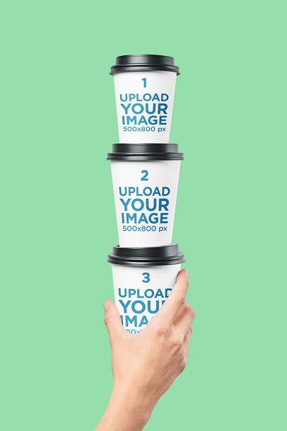 Mockup Featuring a Man's Hand Holding a Pile of Coffee Cups 36653-r-el2