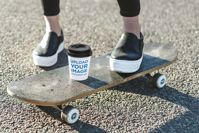 Paper Cup Mockup Featuring a Woman on a Skateboard