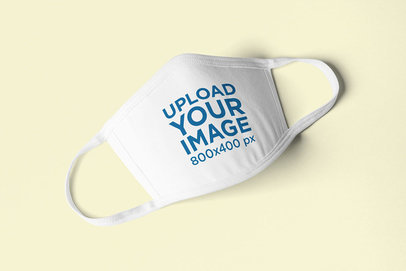Minimal Face Mask Mockup Featuring a Solid Color Background 