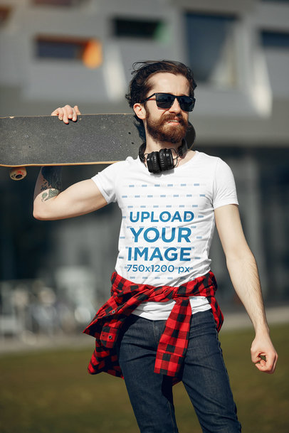 T-Shirt Mockup Featuring a Skater with Headphones Standing on the Street
