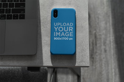 Mockup of a Phone Case for iPhone Placed on a Desk 4616-el1