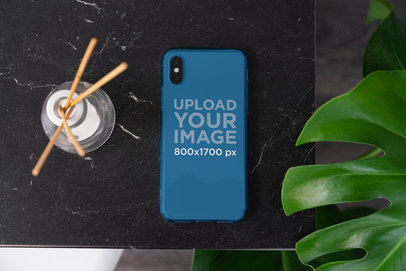 Mockup of a Clear Phone Case Placed on a Tabletop 4634-el1