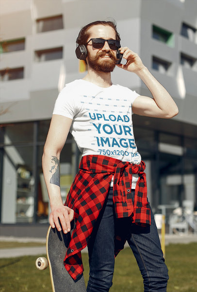 Mockup Featuring a Skater with a Round-Neck T-shirt Listening to Music 