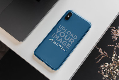 Mockup of a Clear Phone Case for iPhone Placed on a Desk