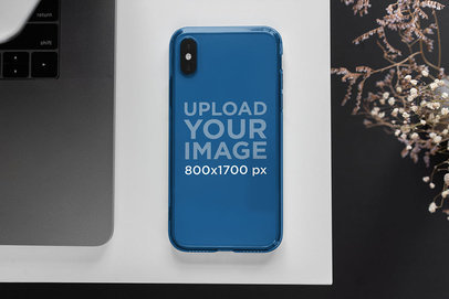 Mockup of a Clear Phone Case Placed on a White Desk