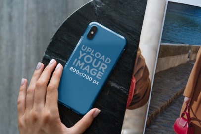 Mockup of a Woman Placing Her Clear Phone Case on a Table