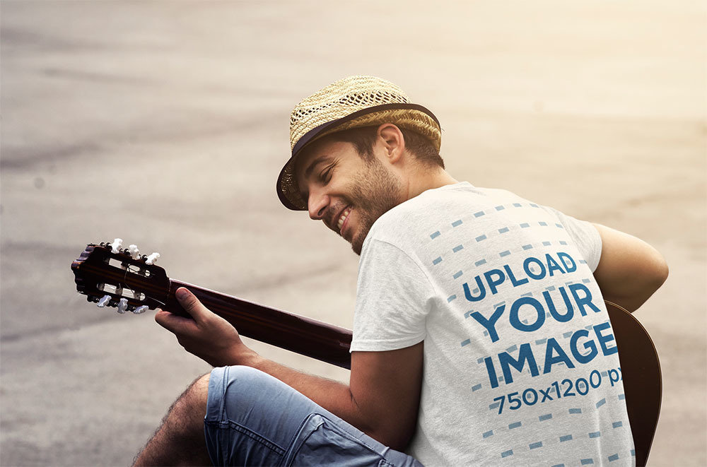 Back-View T-Shirt Mockup of a Man Playing Guitar