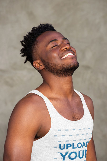 Mockup of a Happy Man Wearing a Scoop Neck Tank Top