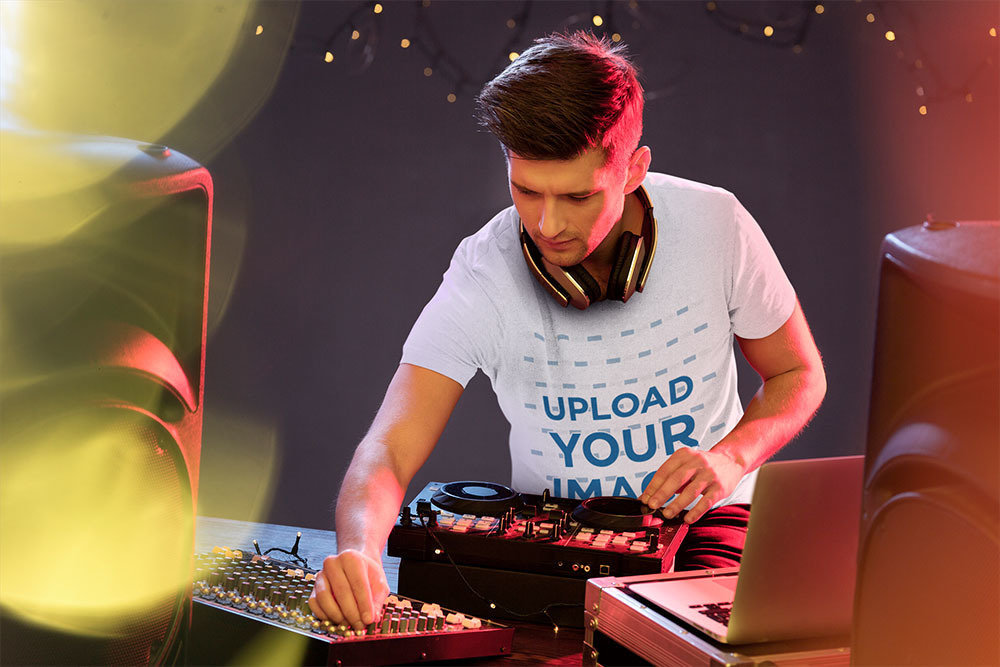 T-Shirt Mockup of a Male DJ on Stage