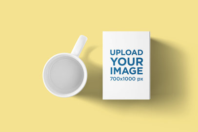 Mockup Featuring a Box Placed Next to a Mug 