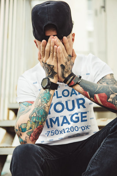 Mockup of a Man with Tattoos Wearing a T-Shirt with Folded Sleeves 37525-r-el2