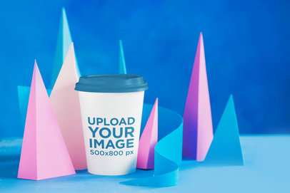 Mockup of a Coffee Cup Featuring Paper-Crafted Pyramids 36872-r-el2