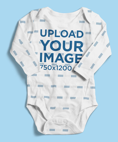 Mockup of a Sublimated Onesie Lying Flat on a Surface