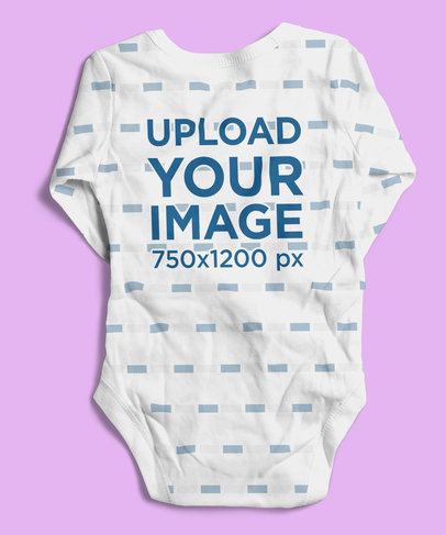 Mockup of the Back of a Sublimated Onesie Lying Flat on a Surface