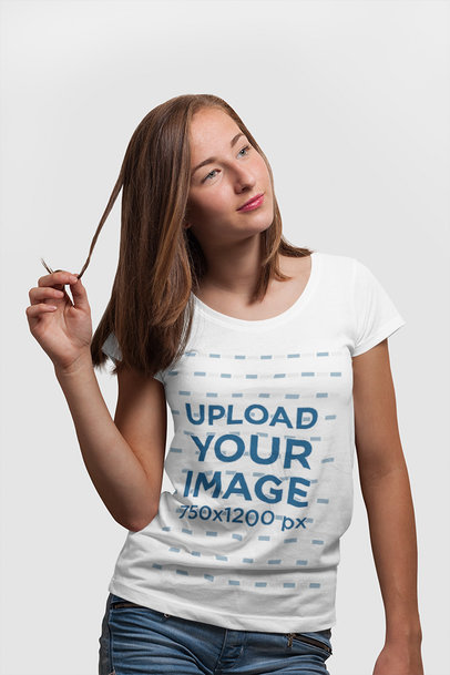 T-Shirt Mockup of a Woman Playing with Her Hair