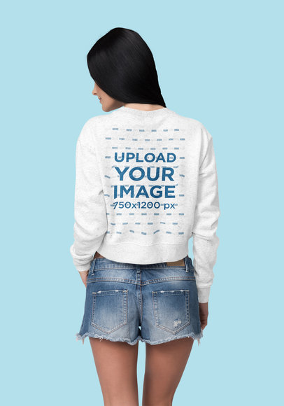 Crop Top Sweatshirt Mockup Featuring a Woman at a Studio