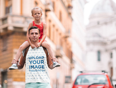 T-Shirt Mockup of a Dad Carrying His Girl