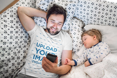 T-Shirt Mockup of a Man Taking Care of His Son