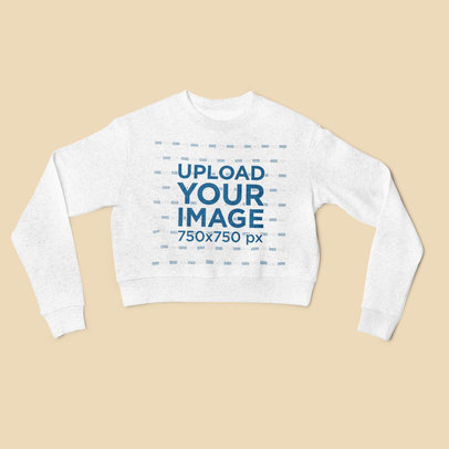 Mockup of a Crop Top Heather Sweatshirt Lying Flat