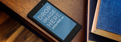 Mockup of a Google Nexus 7 Placed on a Wooden Desk 