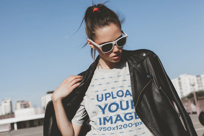 Mockup of a Woman Wearing an Oversize Heathered T-Shirt on the Street 37578-r-el2
