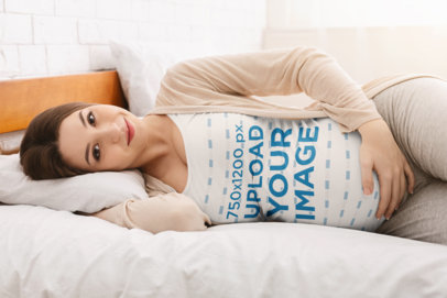 Mockup of a Pregnant Woman with a Tank Top Lying in Bed 