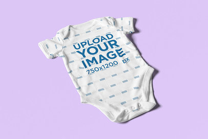 Sublimated Onesie Mockup Featuring a Customizable Surface