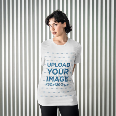 T-Shirt Mockup of Woman Posing with Both Arms Behind Her Back