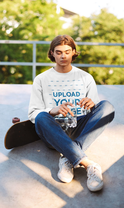 Crewneck Sweatshirt Mockup of a Young Man at a Skatepark