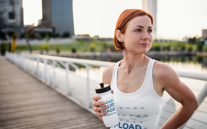 Tank Top Mockup of a Woman Holding a Bike Bottle 37872-r-el2