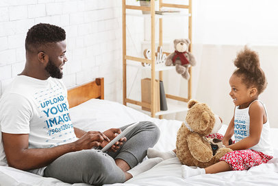 T-Shirt and Tank Top Mockup of a Father Playing with His Little Daughter 