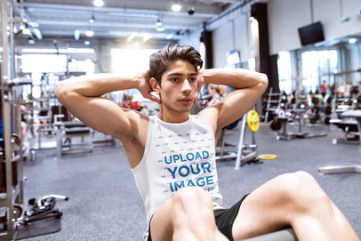 Mockup of a Man with an Activewear Tank Top Doing Crunches
